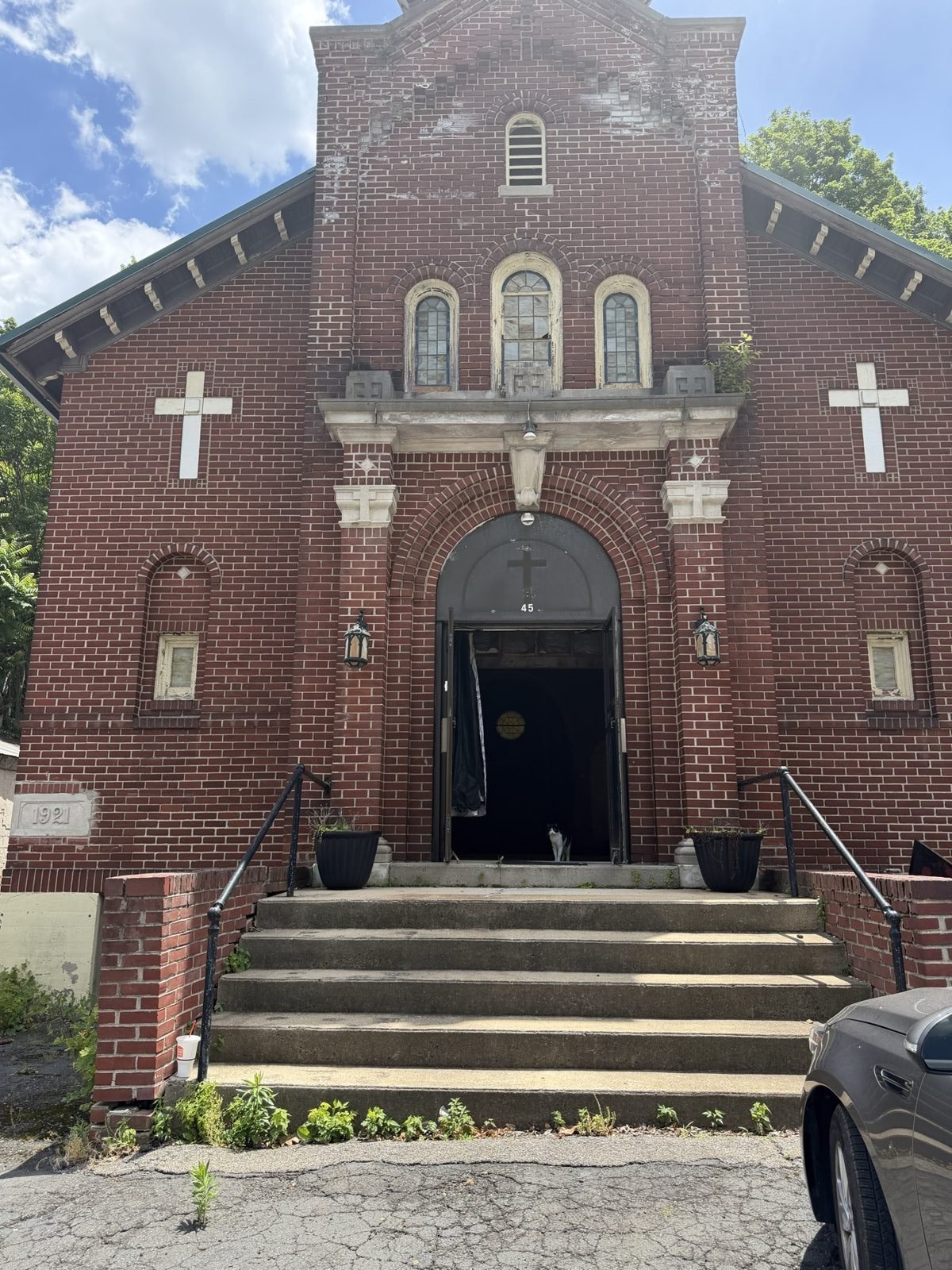 The bell tower over the front entrance