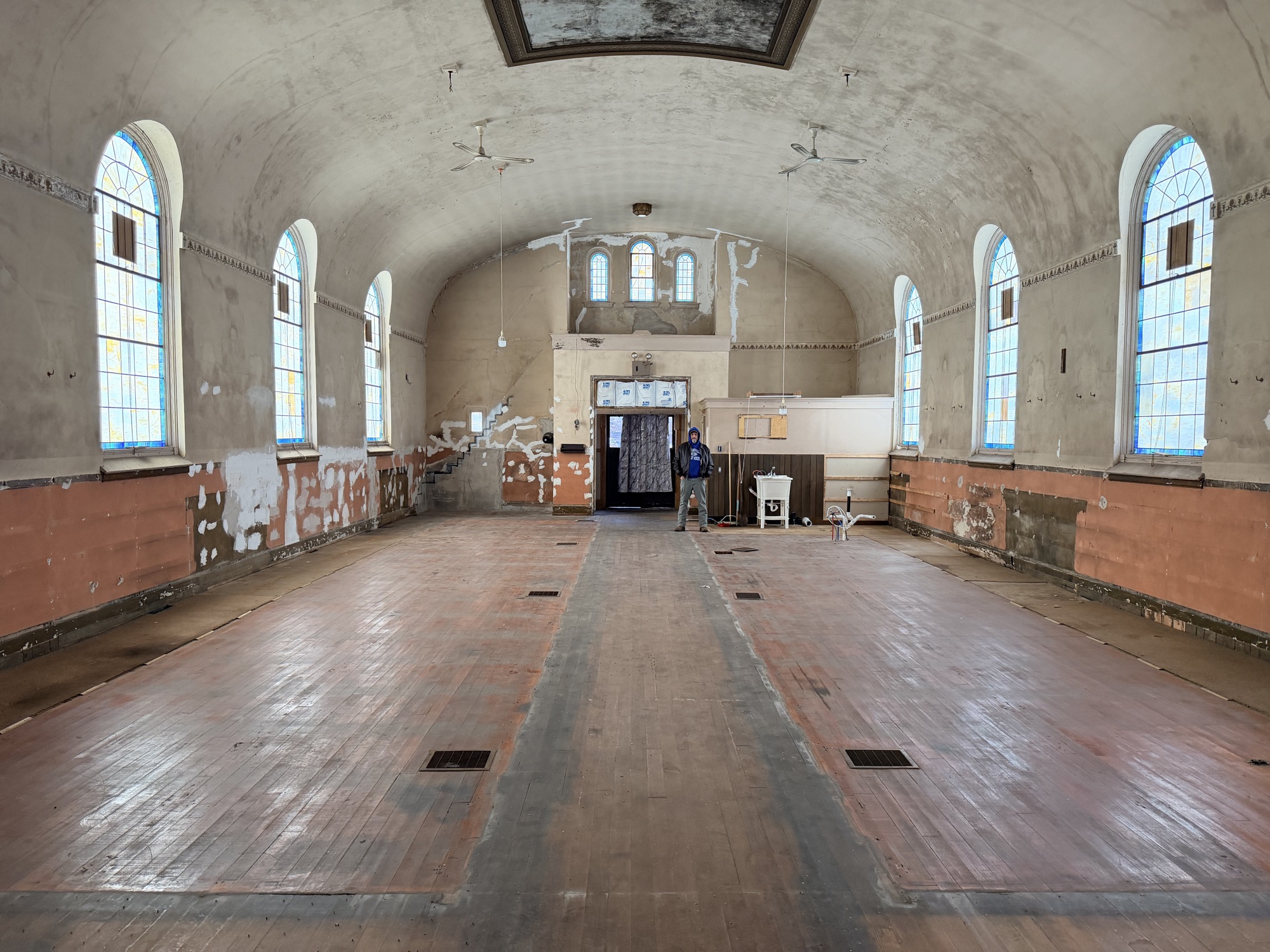 The main hall from the floor, thirty feet up to the vault